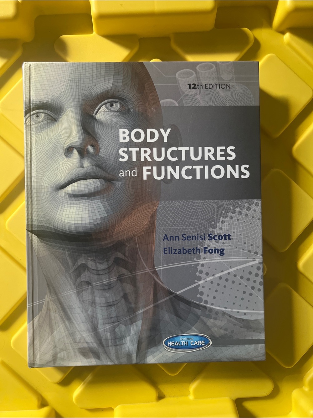 Body Structures and Functions Textbook - Gray Cover with Blue Accents